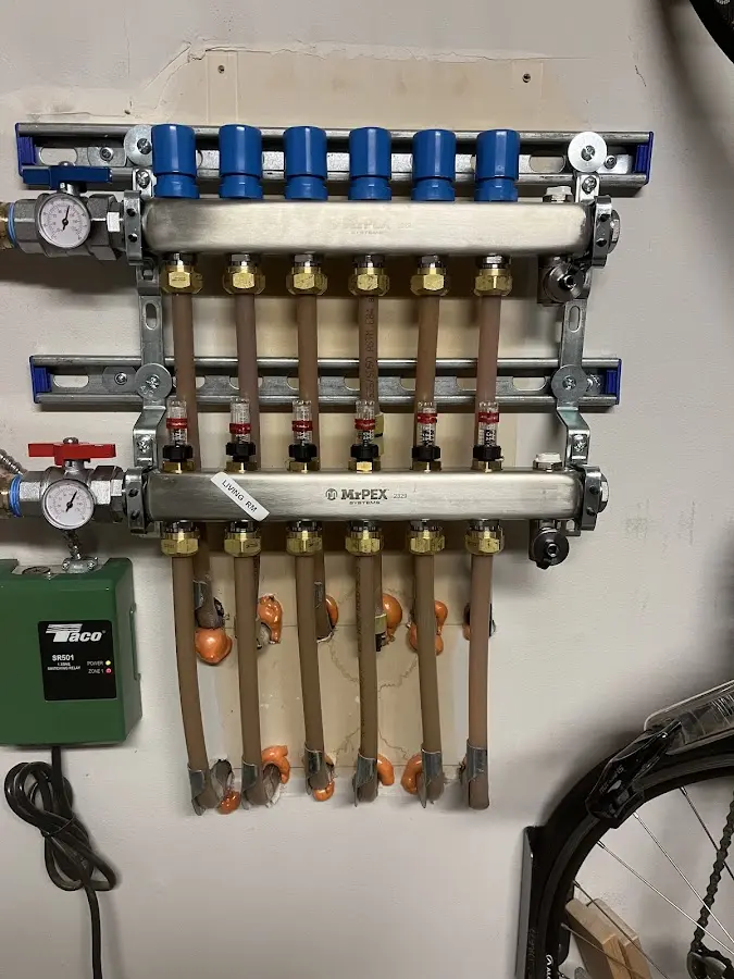 Plumber performing Water Heater Repair at a residential property in Ottawa